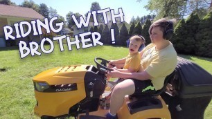 'Two brothers mow the lawn on a riding mower! KIDS AND LAWNMOWERS | Lawnmower Boy #19'