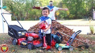 'Leaf pile clean up with our lawn mower, weed eater and leaf blower | Lawn mowers for kids'