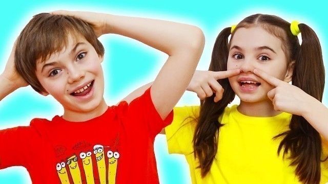 'Head Shoulders Knees and Toes children song | Learn body parts Kids Songs with Nick and Poli'