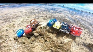 'A miniature car from the movie [Cars] rampages in the sea.'
