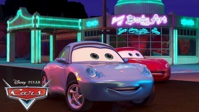 'The Neon Lights Turn On At Radiator Springs | Pixar Cars'