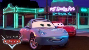 'The Neon Lights Turn On At Radiator Springs | Pixar Cars'